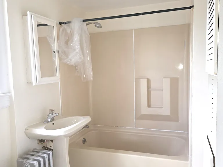Full Bath w/ Large Linen Cabinet