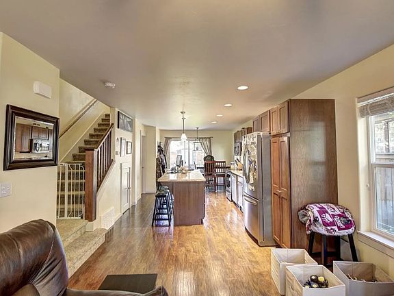 From living room looking into kitchen and dinning area.