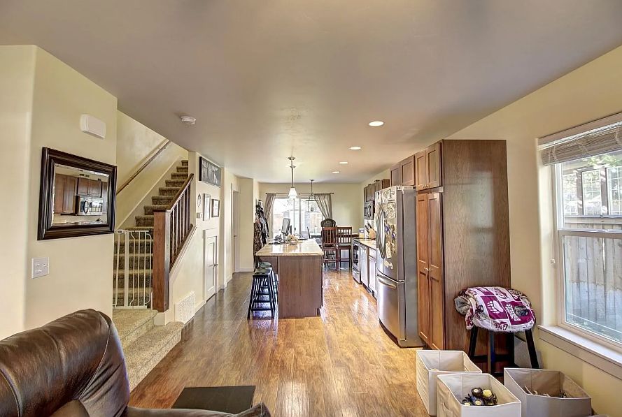 From living room looking into kitchen and dinning area.