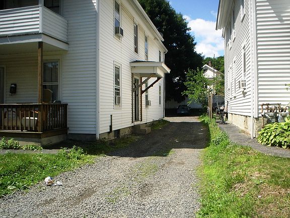 Driveway to parking in back of home