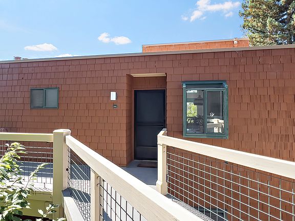 not the exact unit- a Similar TOP FLOOR unit but on a sunny day