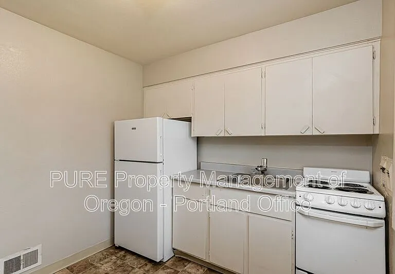 7016 N Amherst St — Photo 9