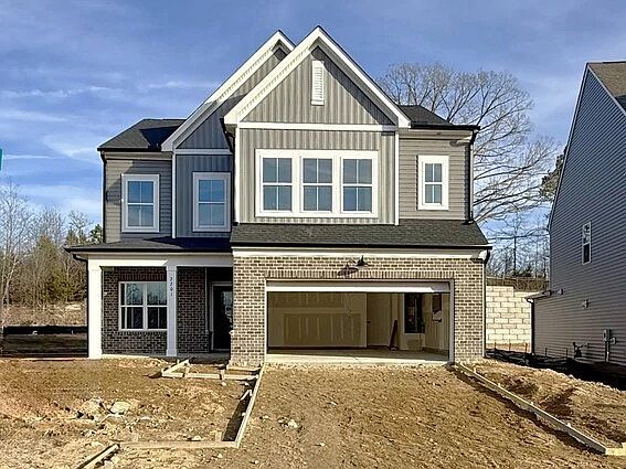 Exterior - Earthy textures and warm tones feel rooted in place.