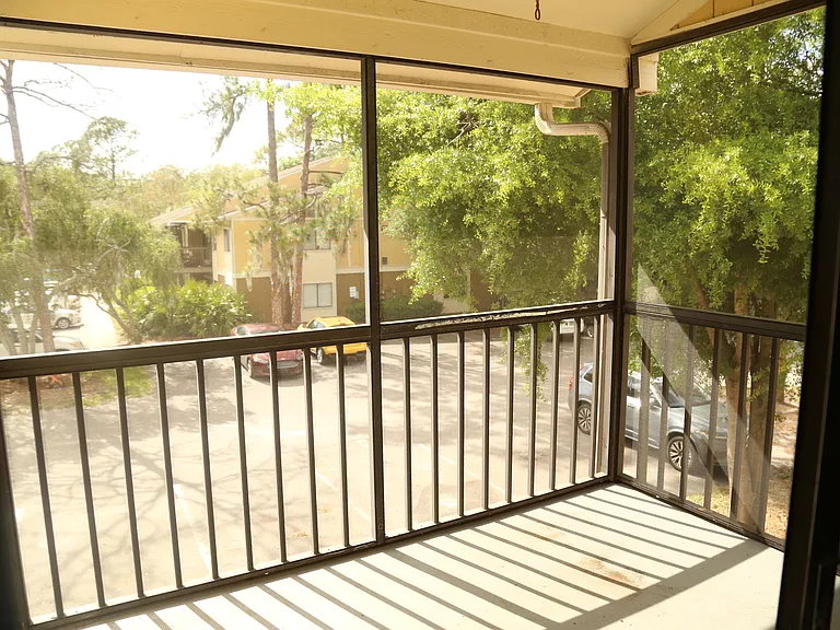 Screened in porch off of living room