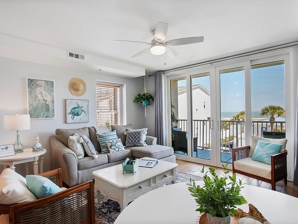 Super comfy living space with balcony that has amazing ocean views.