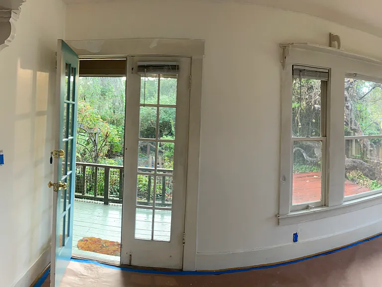 Dining room and Living room with French doors to the veranda