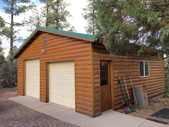 Detached garage with metal roof