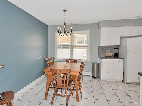 5th image of 9901 S Kolmar Ave
