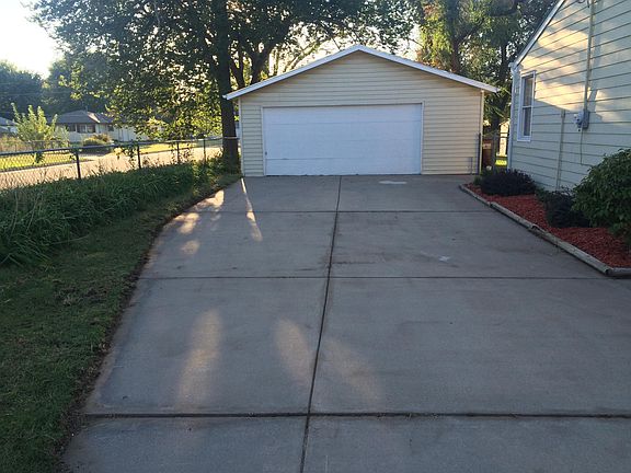 Large driveway and garage