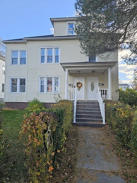 Front of house - unit is located on second floor