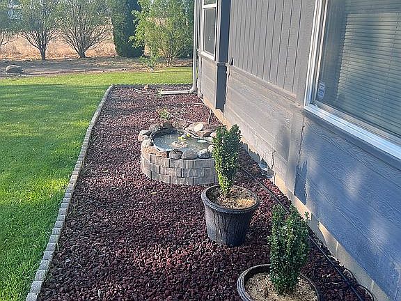 Front rock bed and pond