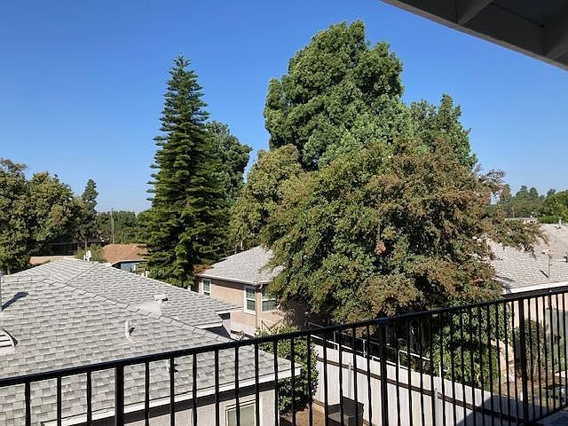 Unit has housetop views.