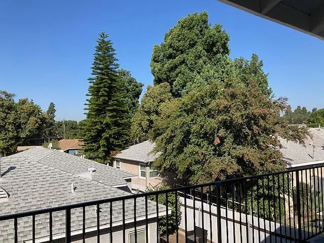 Unit has housetop views.