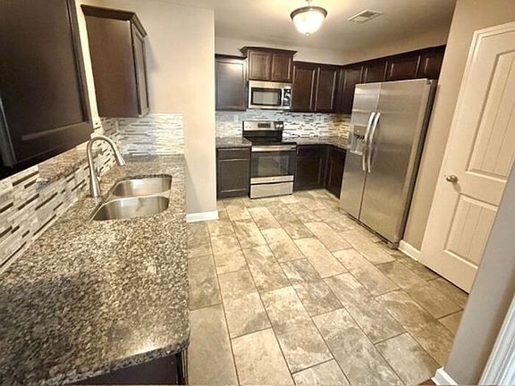 4th image of 8114 Woodson Dr