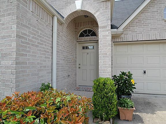 Arched front doorway inviting you inside.