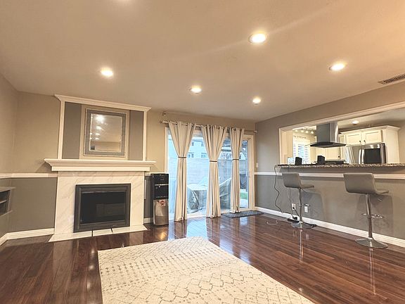 Gas fireplace, slider door to spacious backyard
