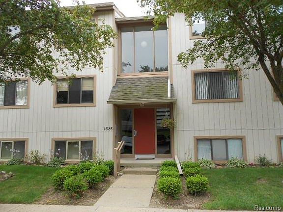 exterior of building- condo is the upper right