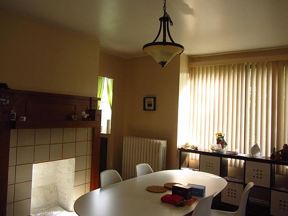 Dining room connected to living room and under the lofted of