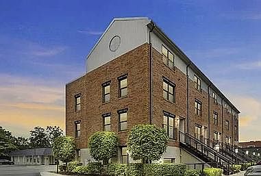 Unit is the left-most of the building.