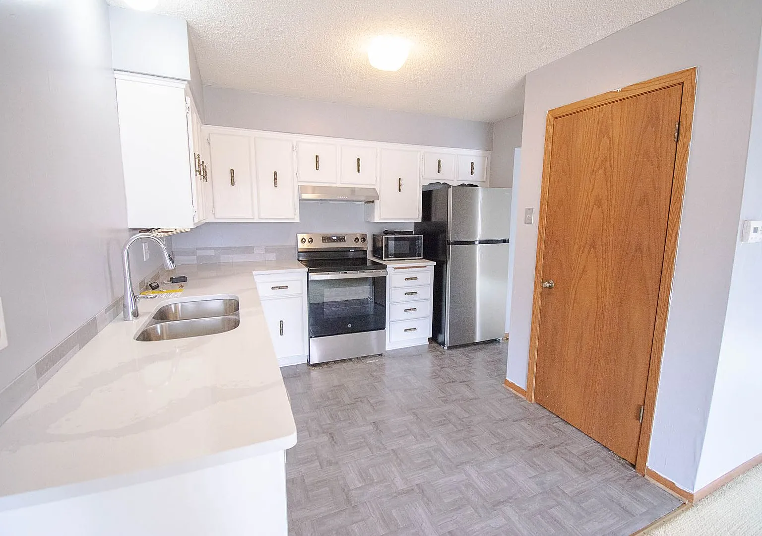 2BR Twin Home with Garage & Great Outdoor Space! — Photo 3