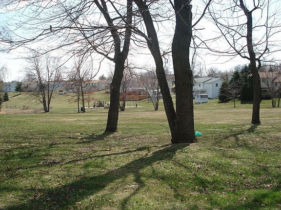 Common area park backing up to the home