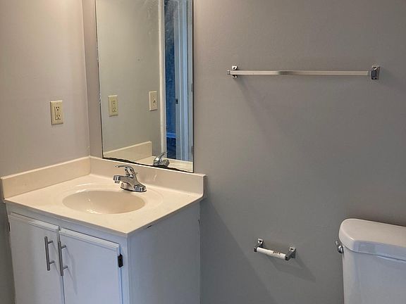 ONE OF THE TWO EN-SUITE BATHROOMS