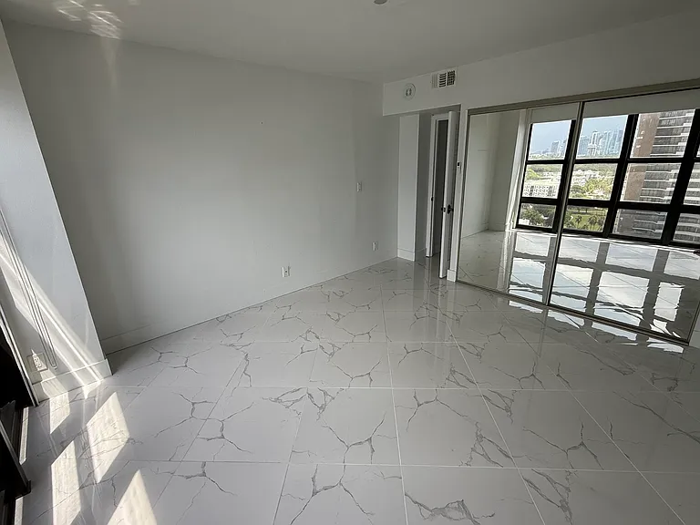 GUEST BEDROOM or OFFICE with dimmable designer lighting, full wall mirror, floor-to-ceiling impact windows, electric blackout curtain, zebra shades & large closet system