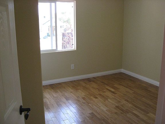 INSIDE OF FIRST BEDROOM WOOD FLOOR THROUGHOUT!!!