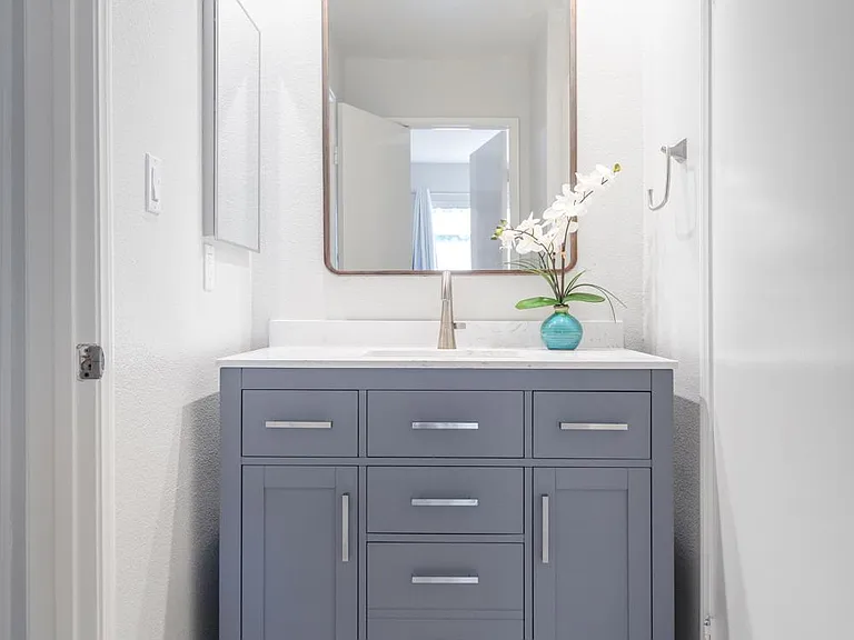 Modern bathroom vanity adjoining downstairs full bathroom