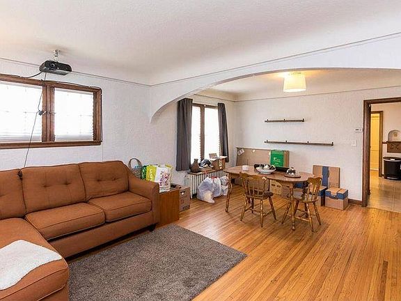 Living and dining rooms, seen here with furniture