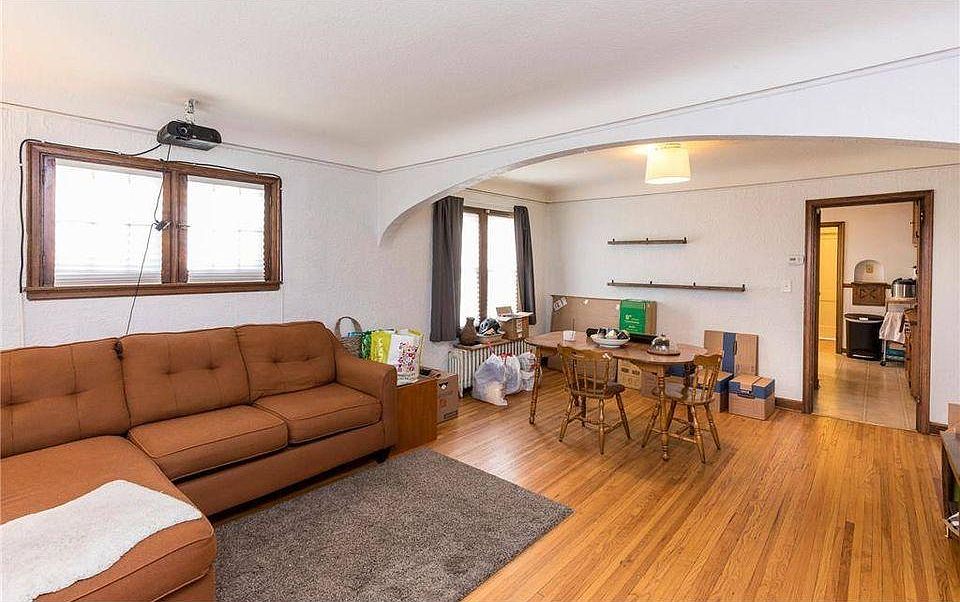 Living and dining rooms, seen here with furniture