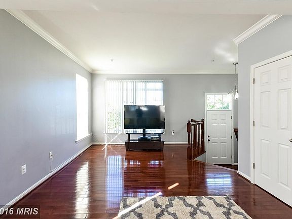 Foyer to living room...gorgeous hardwood floors