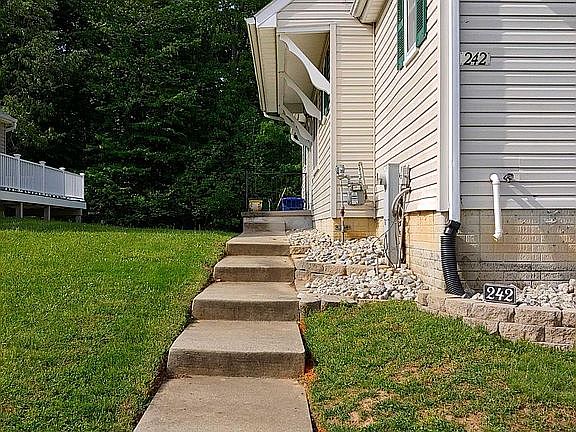 4th image of 242 Woodland Green Way