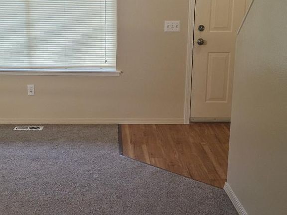 Sunny, vinyl windows, blinds and curtain rods included