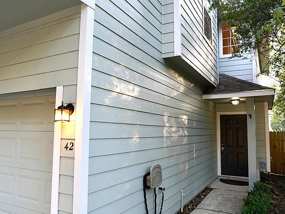 Tiny boxwoods line your walk to the front door.