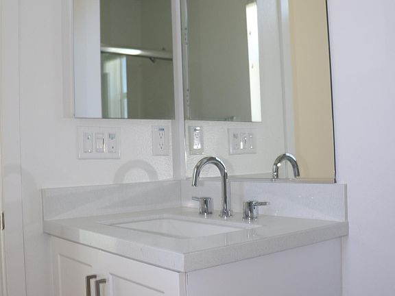 1st floor bathroom sink and mirror