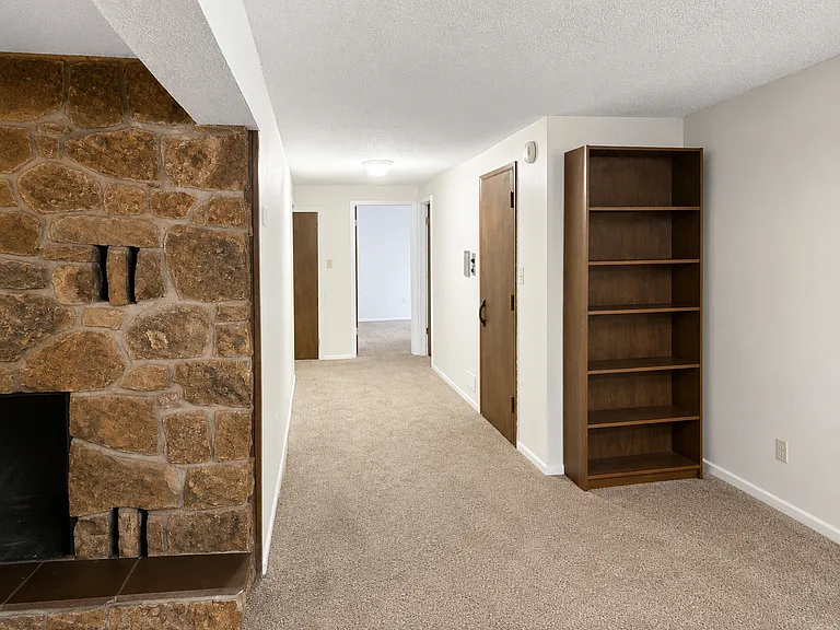 Hall to Sauna, Art Room, 2 Bedrooms, Showers and Bathroom