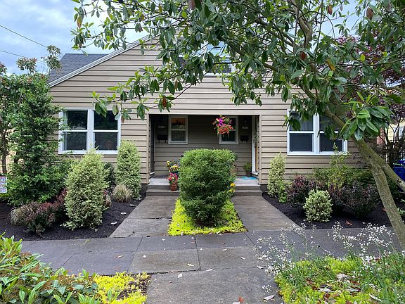 Front of home, door on the right