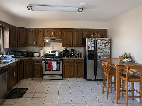 Modern eat in kitchen with warm accents