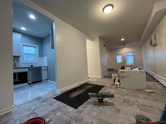 KITCHEN, DINNING, AND LIVING AREA