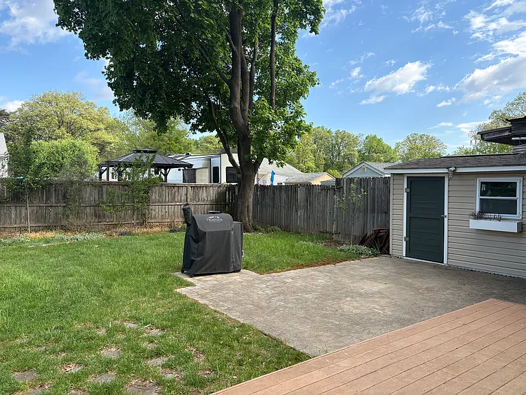 Patio off deck with additional storage