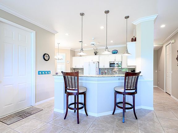 5th image of 5050 Yacht Harbor Cir APT 103
