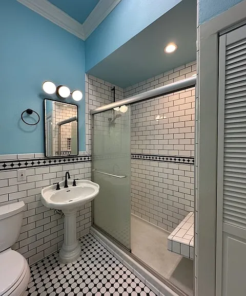 The second floor Bath also has a walk-in shower, and a linen closet. It's a quirky bathroom to be sure, but we inherited it and liked it, so we just made it better.