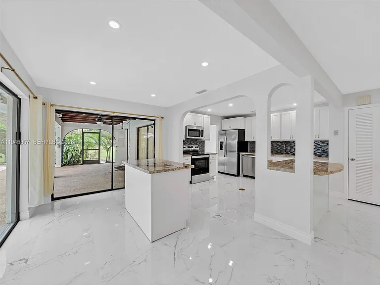 10251 NW 39th Ct — Photo 34