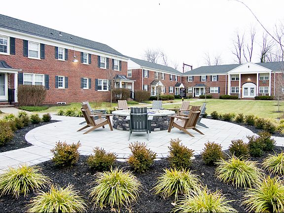 Lush courtyard, cozy fire pit and social seating