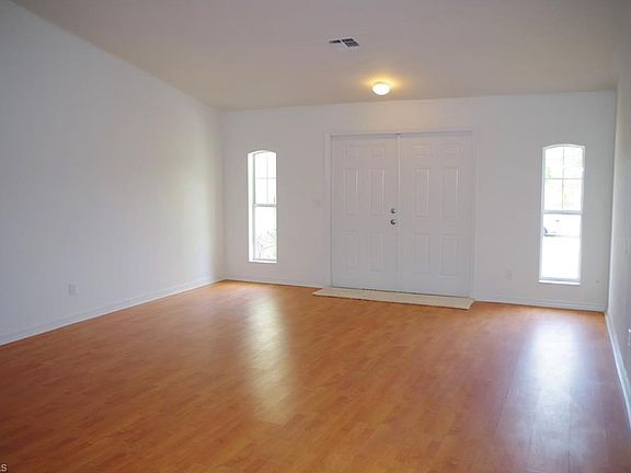 Double door entry and vaulted Great Room