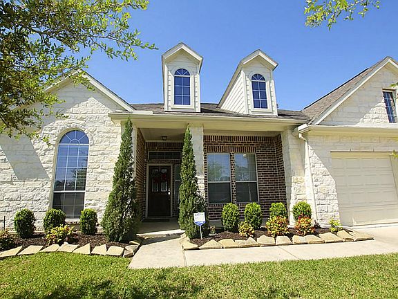 BEAUTIFUL BRICK AND STONE ELEVATION