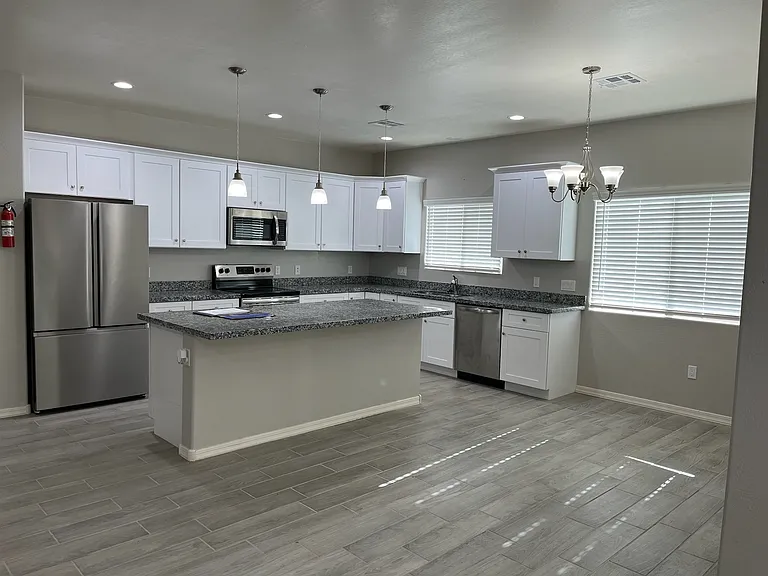 9501 W Kramer Pl — Photo 2