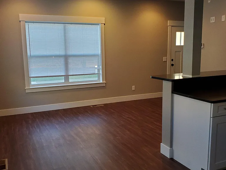 Looking from the Dining Area to the Front Door.