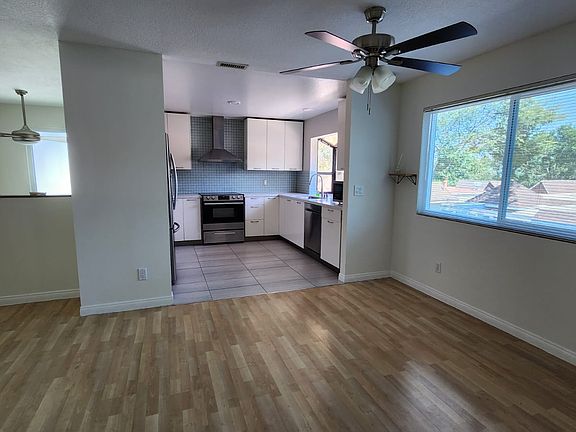 Large kitchen off of the dining nook with a bay window.